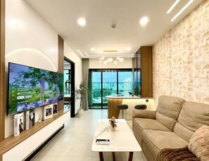 Appartement Deluxe, 2 chambres, vue ville | Coin séjour