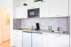 Fridge, microwave, dishwasher, coffee/tea maker