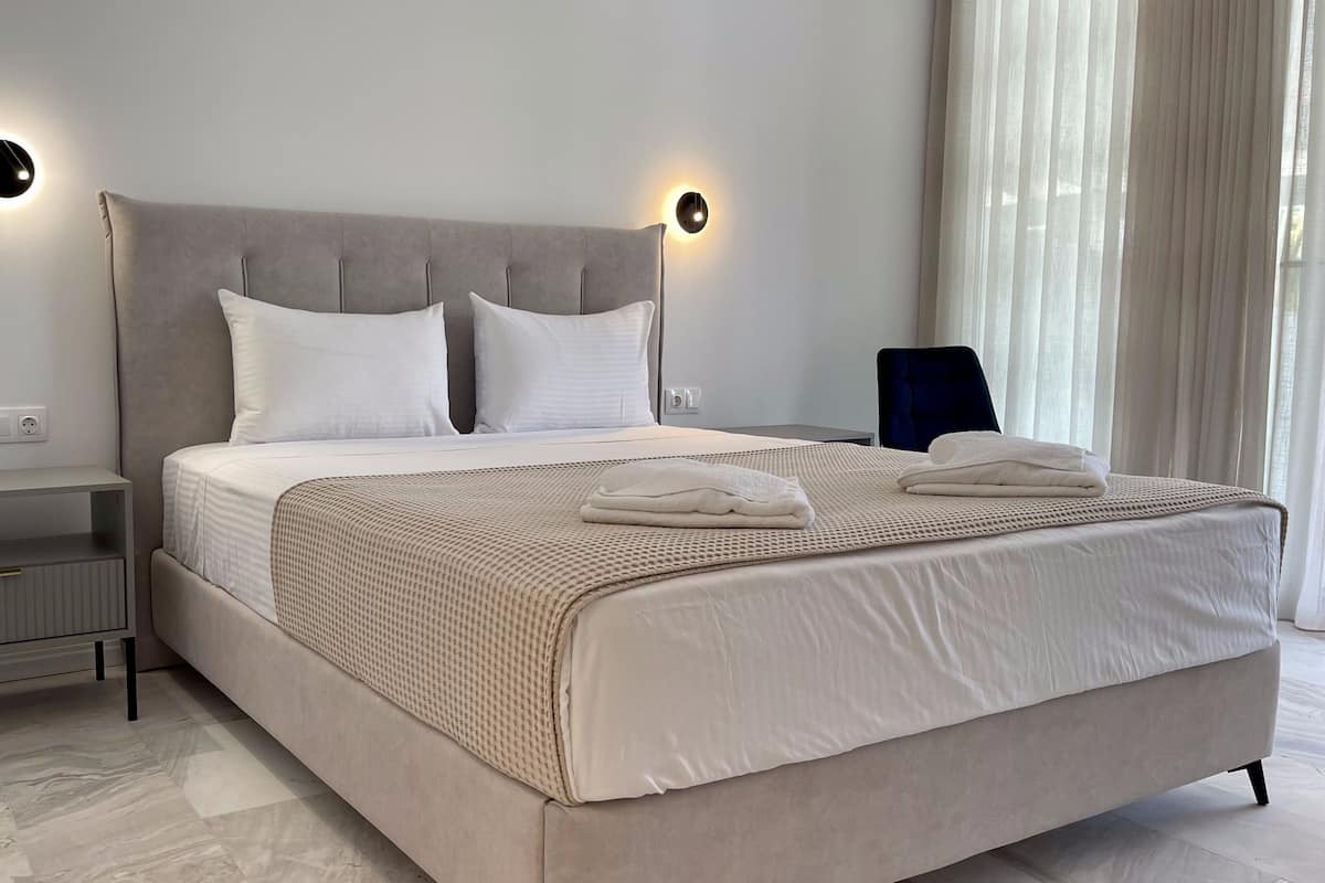 Chambre Deluxe Double ou avec lits jumeaux | Coffres-forts dans les chambres, Wi-Fi gratuit