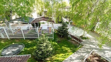Luxury Suite, Balcony, Garden View | Terrace/patio