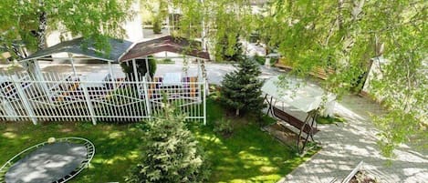 Luxury Suite, Balcony, Garden View | Terrace/patio