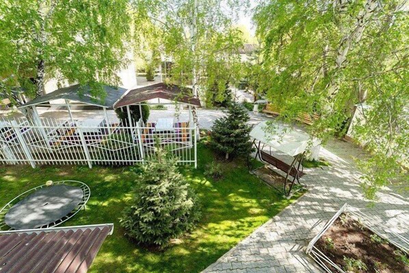 Luxury Suite, Balcony, Garden View | Terrace/patio