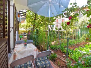 Lägenhet - 1 sovrum - rökare - uteplats | Trädgård