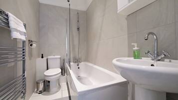 Hair dryer, towels, soap, toilet paper