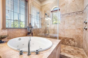 Shower, jetted tub, hair dryer, towels