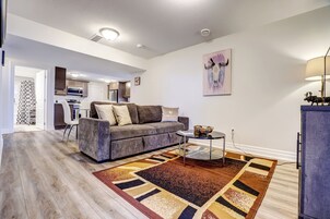 Family Apartment, 4 Bedrooms, Kitchen, Courtyard View | Living area | 43-inch flat-screen TV with satellite channels, Netflix, Hulu