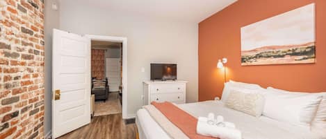 4 bedrooms, desk, iron/ironing board, travel cot
