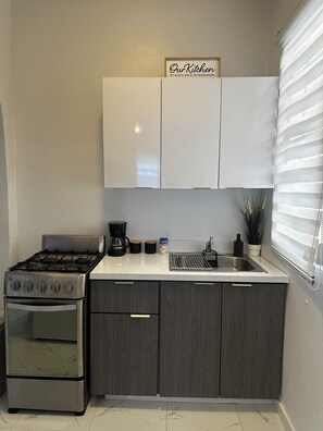 Fridge, microwave, oven, coffee/tea maker