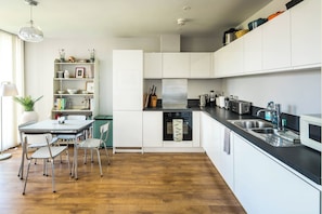 Departamento clásico, balcón | Cocina privada