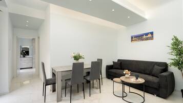 Design Apartment, 2 Bedrooms | Living area | TV
