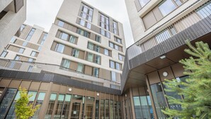 A multi-story building with a modern architectural design, featuring large windows and a balcony. - Crow's Nest (Cork)