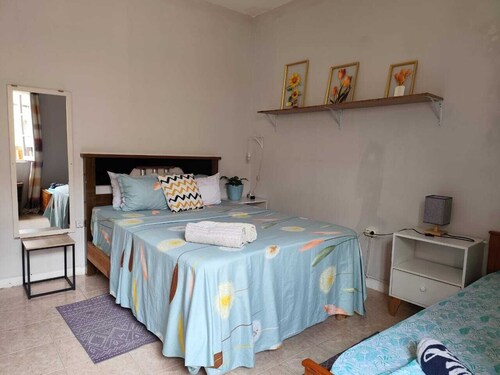 Spacious 4-bedroom apartment in Praia with WiFi, for big size families.