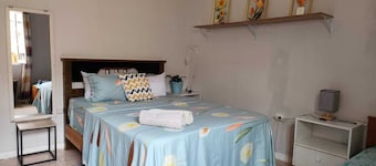 Spacious 4-bedroom apartment in Praia with WiFi, for big size families.