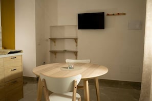 Basic Double Room, Patio | Living area