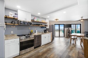 Condo, Multiple Beds (Regatta 201A) | Private kitchen | Oven, toaster