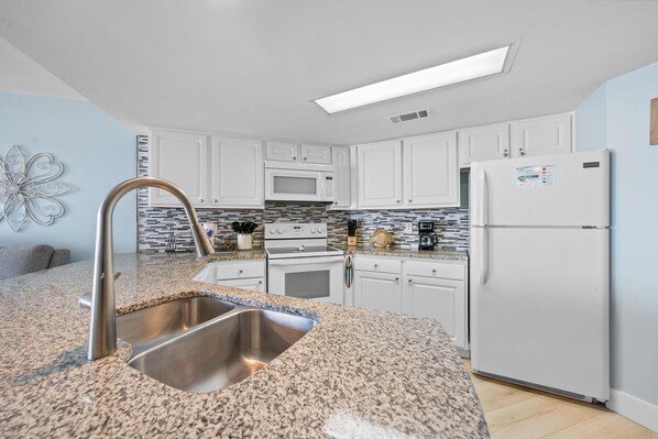 Condo, Multiple Beds (Regatta 204A) | Private kitchen | Oven, toaster