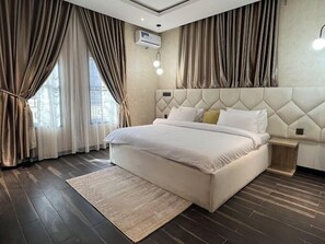 Junior Apartment, Balcony, City View | 2 bedrooms, desk, laptop workspace, iron/ironing board