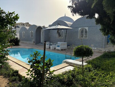Exceptional Arabo-Andalusian-style house with beachfront pool.