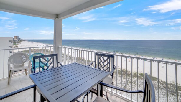 A balcony with a view of the beach and ocean. - Tropic Isles 801 (Gulf Shores)