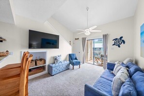 Condo, varias camas (Sugar Beach 323) | Área de sala de estar