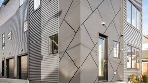 Un bâtiment moderne à deux étages, doté d’une façade géométrique, de grandes fenêtres et d’une entrée de garage bien visible.