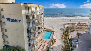 A Whaler hotel with a pool, beach view, and multiple balconies. - The Whaler B3 (Gulf Shores)