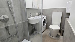 Dusch, hårtork och handdukar