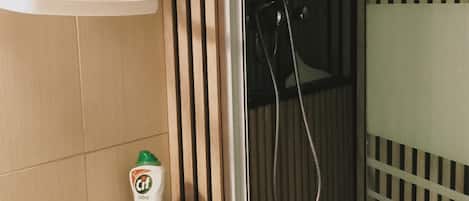 Shower, hair dryer, towels, soap