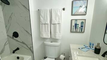 Hair dryer, towels, soap, shampoo
