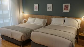 2 dormitorios, tabla de planchar con plancha, wifi y ropa de cama