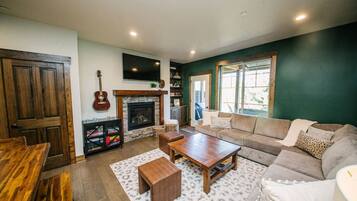 Smart TV, fireplace, books