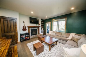 Smart TV, fireplace, books