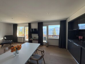Family Apartment, Kitchen, Mountain View | Private kitchen | Mini-fridge, microwave, espresso maker, highchair - Crans Montana Suites (Crans-Montana)