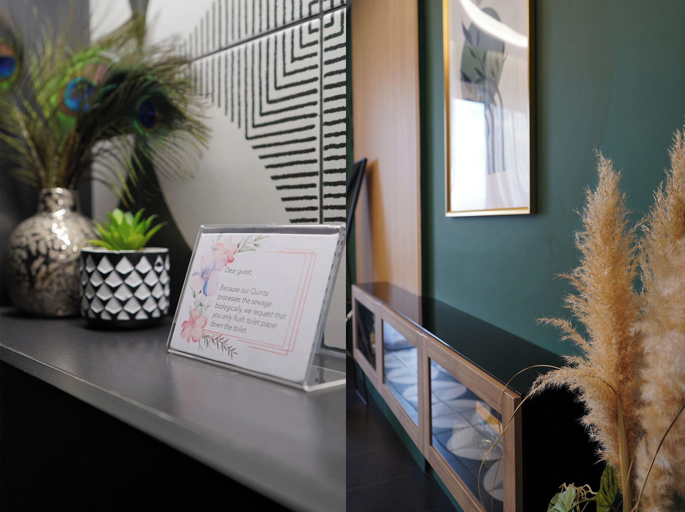 A reception desk with a sign requesting guests to flush toilet paper.