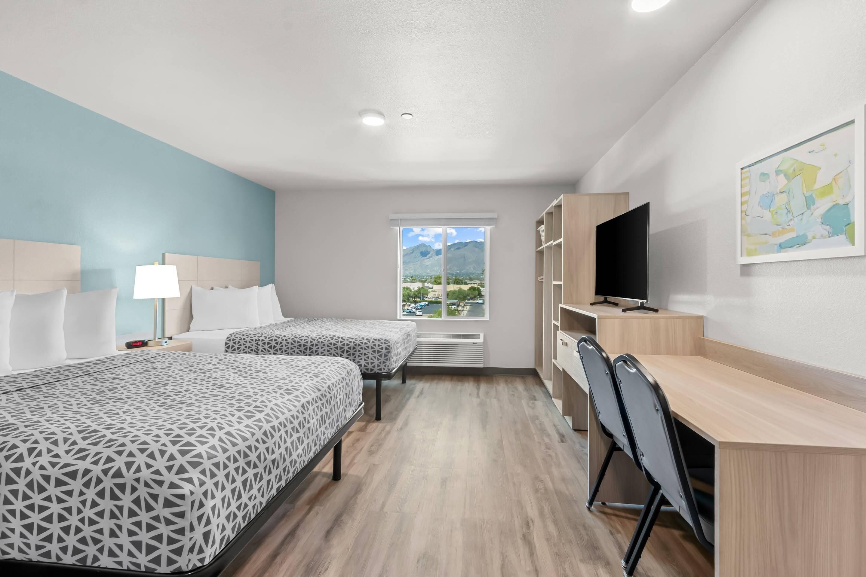 Suite, 2 queensize bedden, niet-roken | Een bureau, gratis wifi, beddengoed