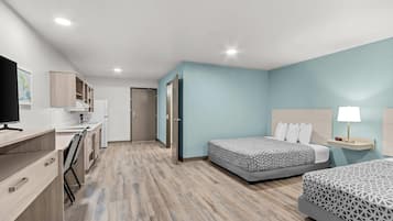 Suite, 2 camas Queen size, con acceso para personas discapacitadas, para no fumadores | Escritorio, wifi gratis y ropa de cama