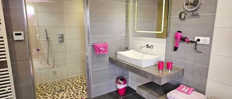 Shower, hair dryer, towels, soap