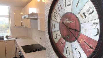 Fridge, stovetop, toaster, cookware/dishes/utensils