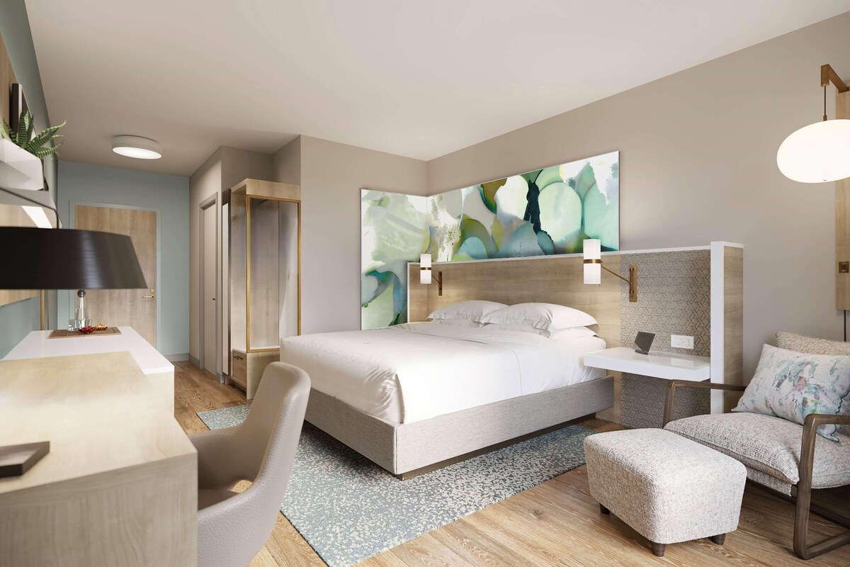 Premium bedding, down duvets, memory-foam beds, in-room safe
