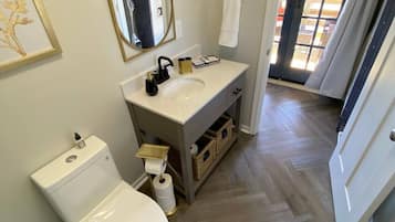 Shower, eco-friendly toiletries, hair dryer, towels