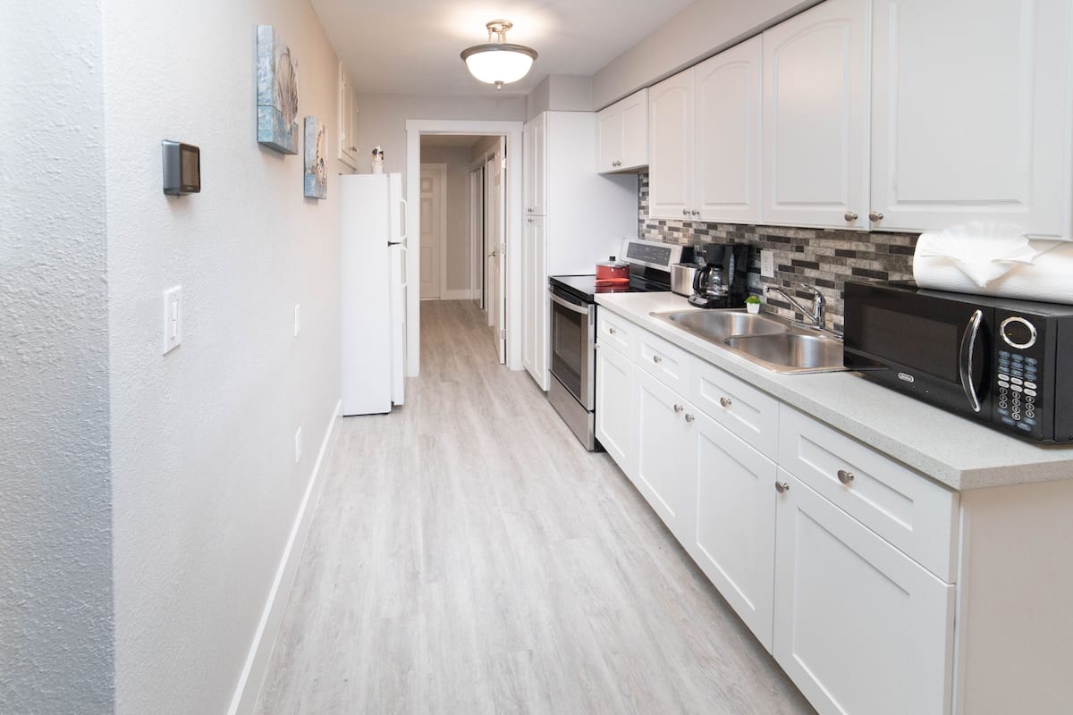 Suite Deluxe, patio | Cuisine privée
