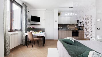 1 dormitorio, tabla de planchar con plancha, wifi gratis y ropa de cama