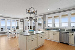 Fridge, microwave, oven, stovetop - On the Rocks by Brunswick Vacation Rentals: 4BR OIB Retreat w/ Pool & Views (Ocean Isle Beach)