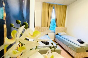 1 bedroom, desk, iron/ironing board, bed sheets