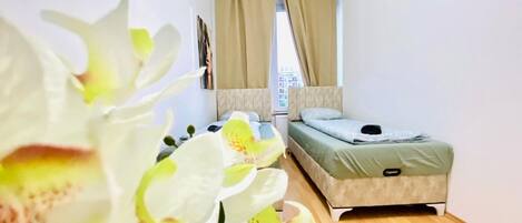 1 bedroom, desk, bed sheets