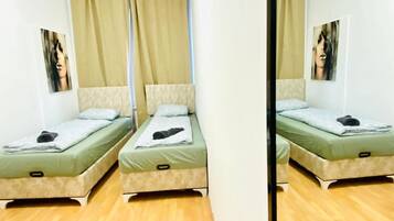 1 bedroom, desk, bed sheets