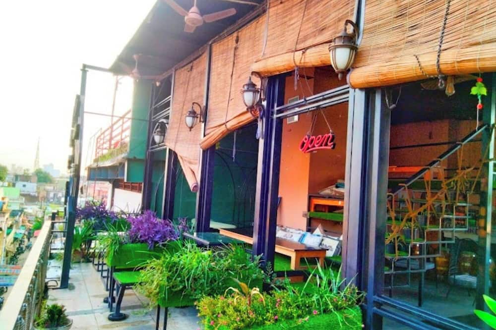 The Clock Tower Rooms & Cafe