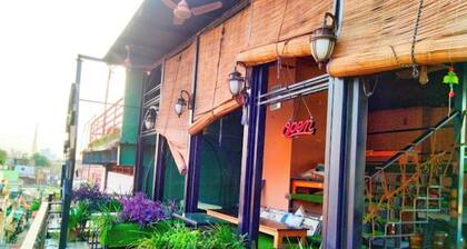 The Clock Tower Rooms & Cafe