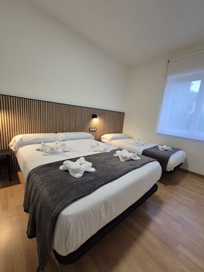 3 habitaciones, tabla de planchar con plancha y wifi gratis