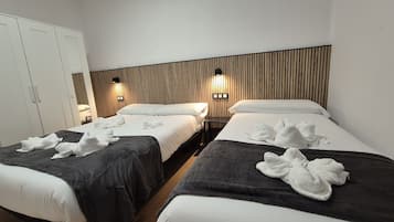 3 dormitorios, tabla de planchar con plancha, wifi gratis y ropa de cama